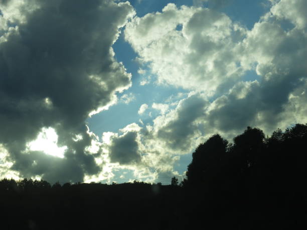 istock Sunlight with dramatic sky on dark background.Vivid sky on dark cloud 2191567653