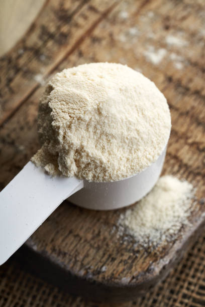 istock Whey protein powder in a measuring cup 2191570431