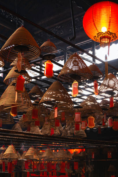 istock Incense Spirals and Red Lanterns in Hong Kong Temple 2191571026