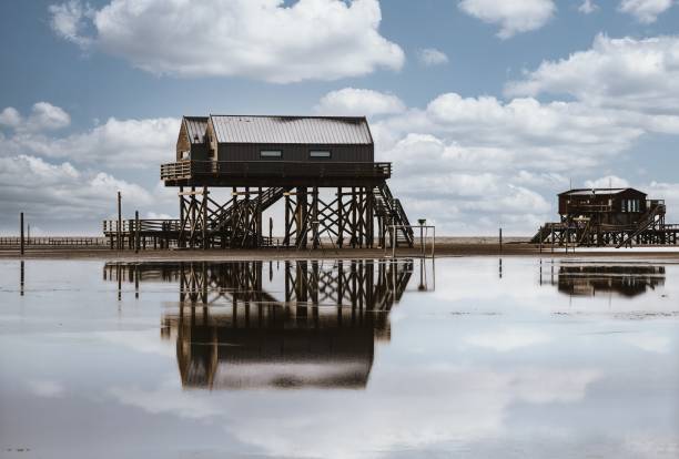 istock Winter view with reflection of the pile dwellings 2191571117