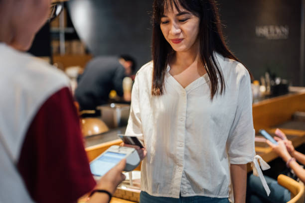 istock Modern Convenience: Contactless Payment at the Cafe 2191575235