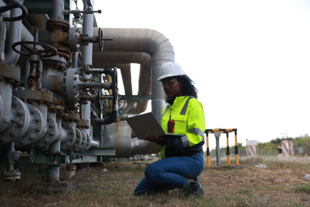 istock A Black Female engineer inspects and maintains technical data on system equipment, water pumps, and various valves on piping systems. 2191577134