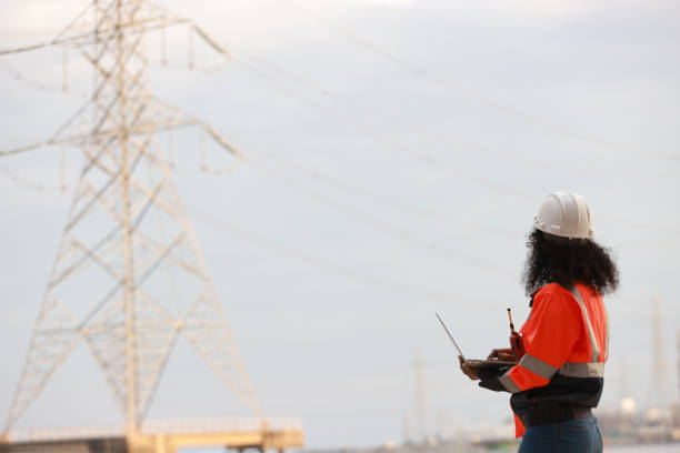istock A Black female electrical engineer using a laptop computer to stand at the electricity station to see the electric power production plan at a high voltage electrode at the pier 2191577146