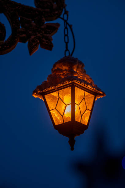 Hanging outdoor lamp at dusk