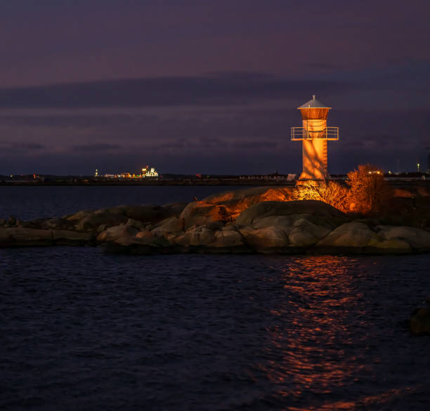 Small white lighthouse in early morning light