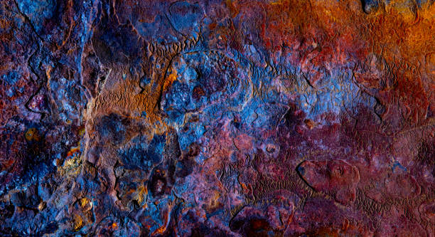 Colorful Abstract Texture of Weathered Surface with Vibrant Rust and Oxidation Hues