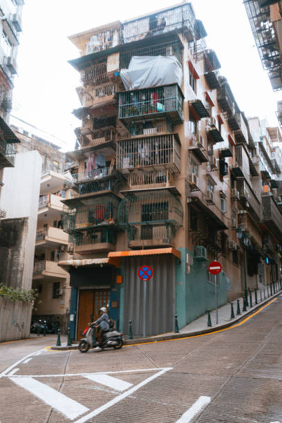 istock An old multi-storey building in Macau with bars on the balconies. 2191578809