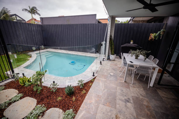 istock Modern backyard with pool and patio in urban setting 2191579491