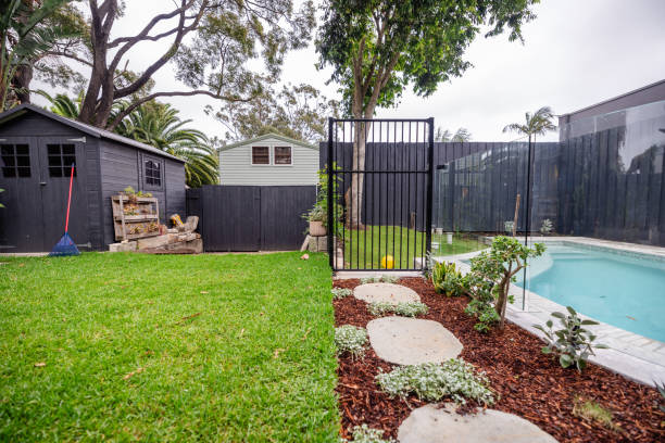 istock Garden view with gate leading to fenced pool area 2191582968
