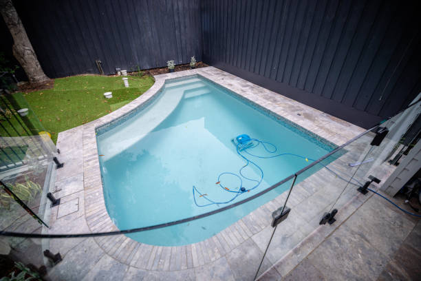 istock Compact private pool with modern glass fencing design 2191584757