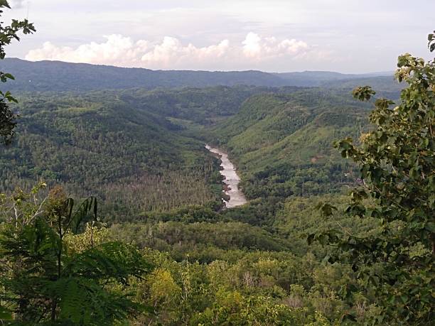 istock River in the Middle of Green Hills 2191585222