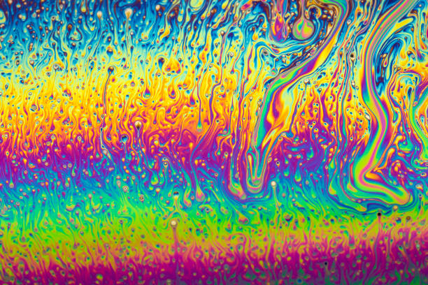 istock Abstract background of a Dynamic interference colors in thin soap films. Bubble rainbow colors. 2191589027