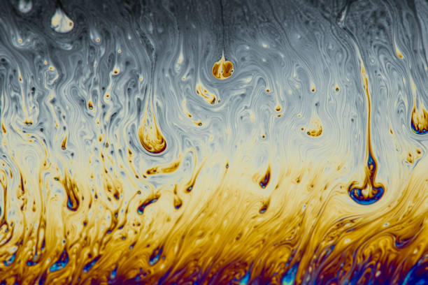 Abstract background of a Dynamic interference colors in thin soap films. Bubble rainbow colors