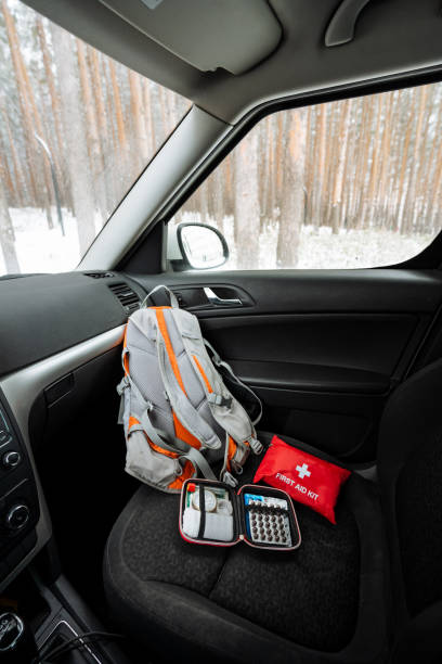 When embarking on a winter road trip, make sure you have your essential backpack packed and a first aid kit securely stored in your car