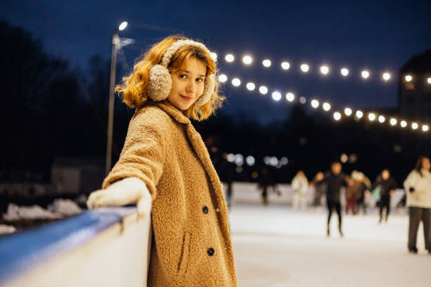 istock Beautiful woman on the ice rink 2191594097