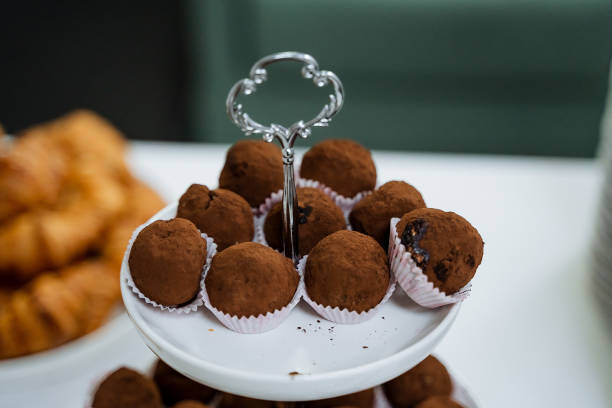 istock Indulge in Decadent Chocolate Truffles Displayed Beautifully on an Elegant Dessert Stand, Perfect for Any Occasion or Celebration 2191594111