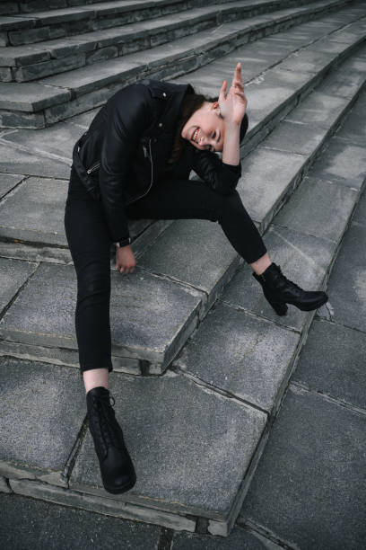 istock Young woman in black 2191595945
