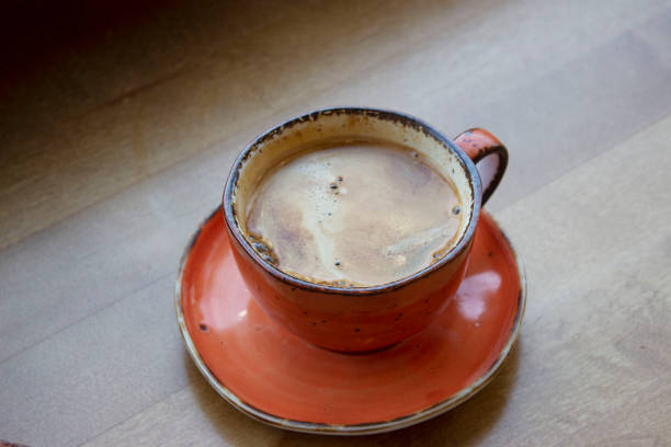 cup of americano coffee on a table in a cafe
