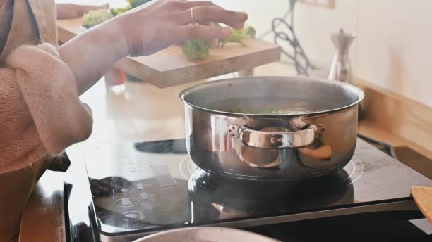 istock Preparing fresh ingredients for cooking on a modern kitchen stove 2191601885