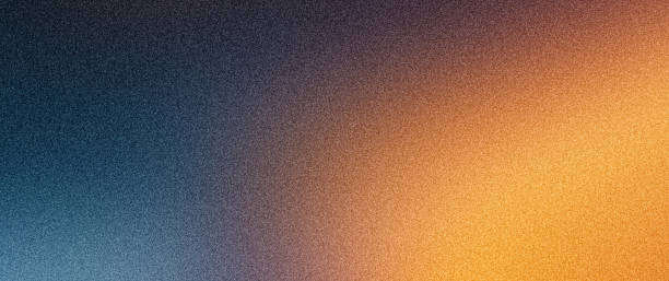 istock Grainy background, orange yellow blue purple glowing noise texture dark banner background, black backdrop 2191607150