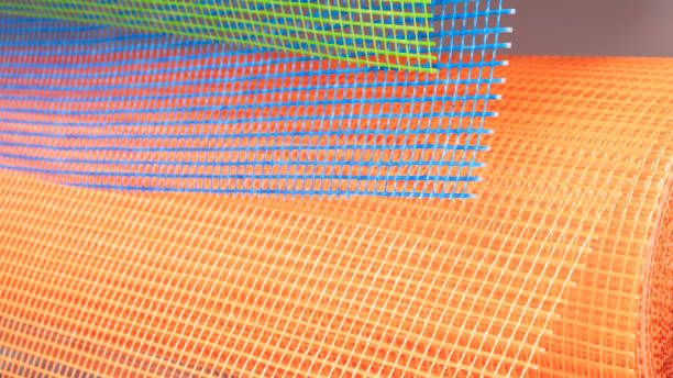 istock A roll of orange and blue mesh fabric 2191608213