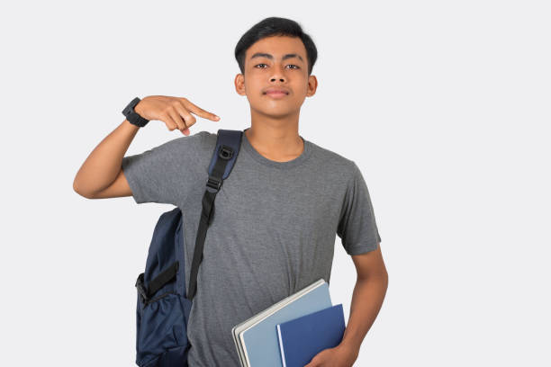 istock Smiling young college student pointing at himself isolated on white background 2191611720