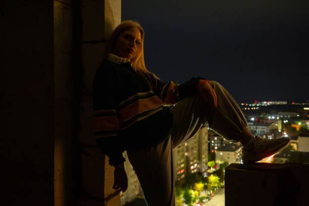 istock Woman on city roof 2191615480
