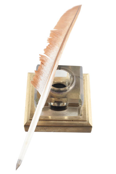 istock vintage feather quill with glass inkwell 2191617391
