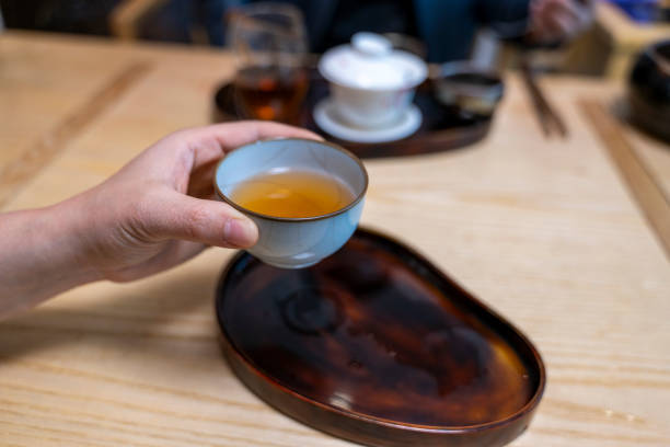 istock A person holding a teacup with their hand 2191623988