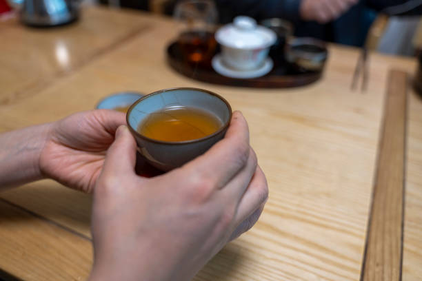 istock A woman holding tea in her hand 2191623996