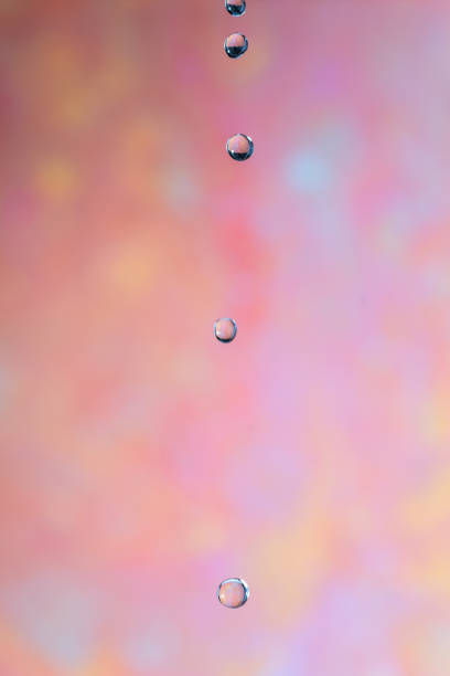 Water droplets falling in succession