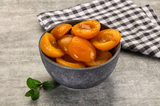 istock Sweet canned apricots with syrope 2191636630