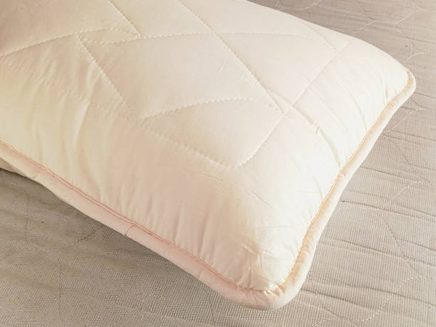 istock A silk pillow. Silkworm pillow. High-quality bed linen for sleeping. A pillow with hypoallergenic filler. 2191641502