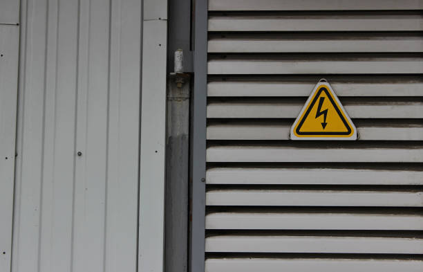 istock Metal Gate Of Transformer Booth With Triangular High Power Sign 2191641577