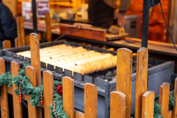 A wooden fence with a Christmas wreath on it