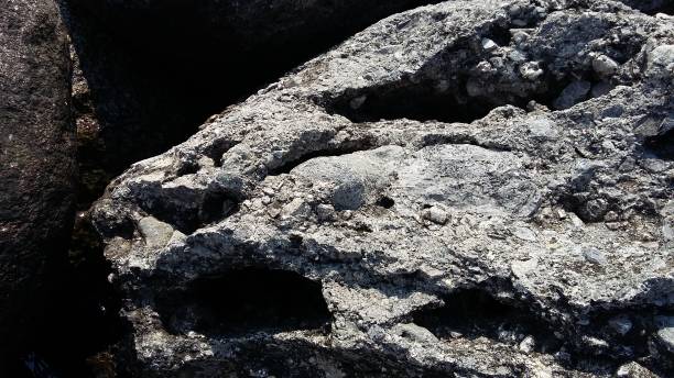 istock Rocks by the lake 2191647303