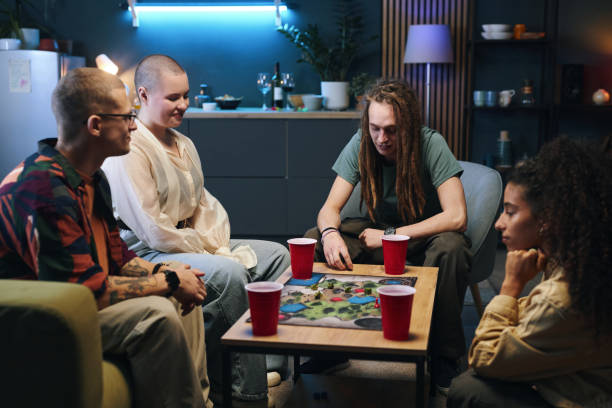 istock Friends Playing Board Game At Party 2191648182