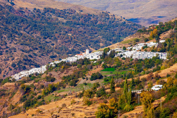 Capileira village aerial panoramic view. Capileira is a village in the Alpujarras area in the province of Granada in Andalusia, Spain.