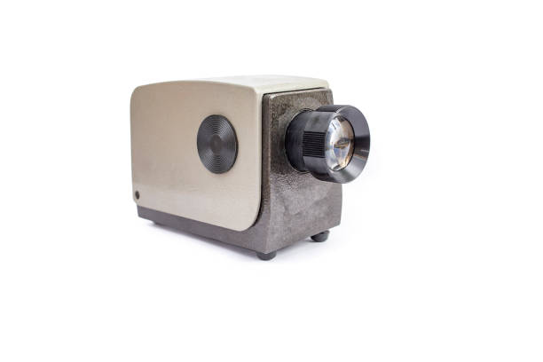 Metallic case retro projector for photographic slides isolated on white, eastern europe technology