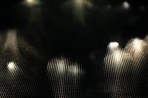 Christmas led lights  , seen thru corrugated glass, abstract textured effect on black