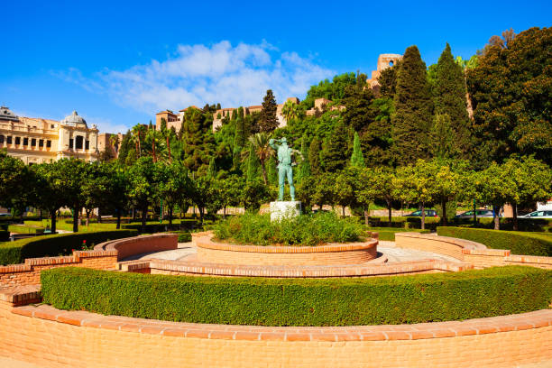 Malaga, Spain - October 23, 2021: Sculpture of the Biznaguero at the Jardines de Pedro Luis Alonso, a public garden in Malaga, a city in the Andalusia community in Spain