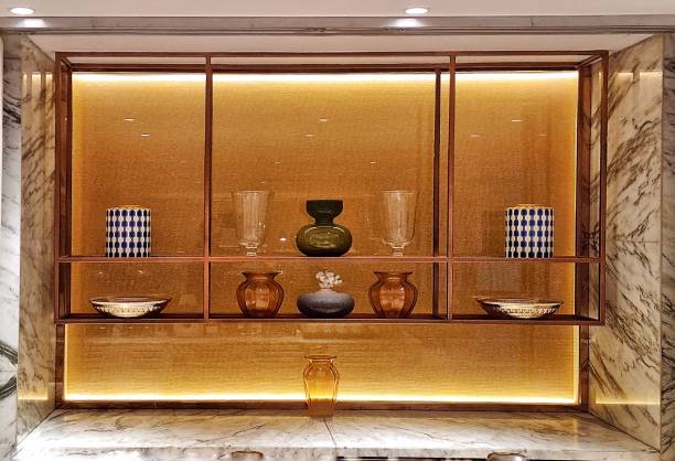 Jakarta, Indonesia - Dec 17, 2024: Vases and bowls placed on a modern design decorative shelf used as indoor decoration