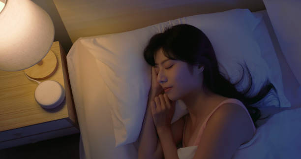 istock asian woman use white noise 2191653128