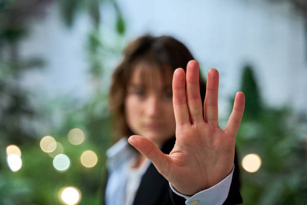 istock Businesswoman making stop sign with hand in office 2191653206