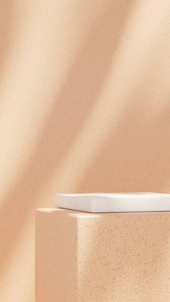 istock A 3D rendering of an empty space featuring a podium on a terrazzo-textured floor with a pink wall in a portrait layout, perfect for showcasing merchandise. 2191656533