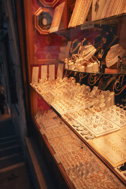 istock Elegant Jewelry Store Window Display with Gold and Silver Pieces 2191656783