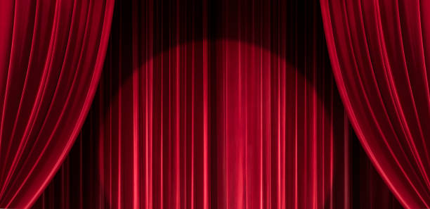 istock Big event red curtains with spotlight. Open the curtain for a stage performance with spotlight Theatre. Nightclub or cabaret show. Presentation of a classic and luxurious work with performing arts. 2191659768
