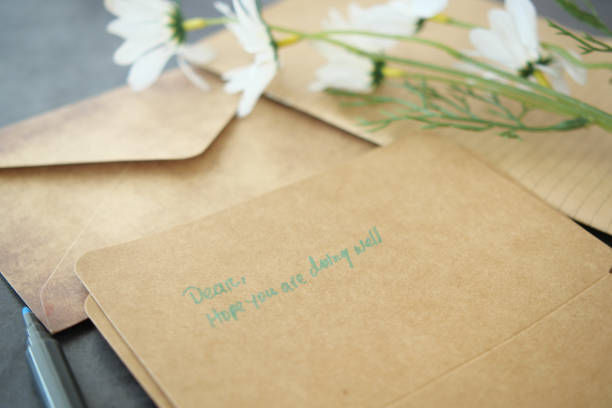 istock Beautiful handwritten notes and charming envelopes with flowers, ideal for heartfelt messages 2191660035