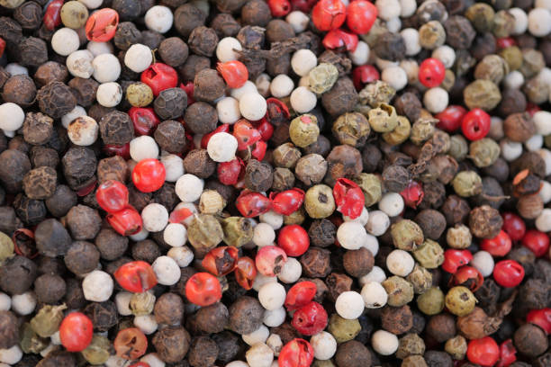 istock Closeup of Mixed peppercorns in a bowl 2191664198
