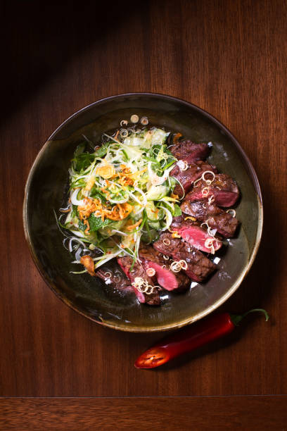 istock Grilled saddle of venison with cucumber salad 2191664847